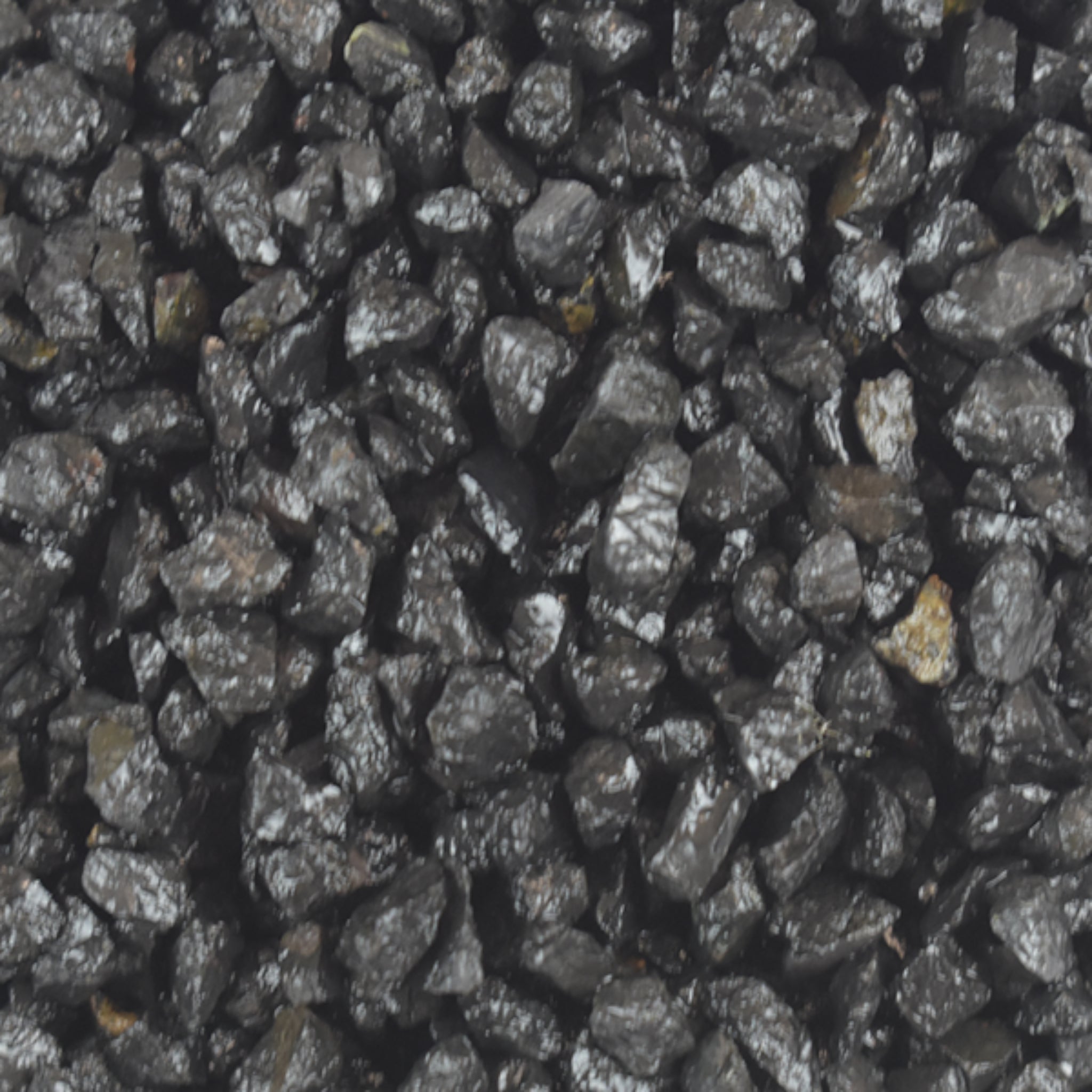 Grava negra para acuario en detalle, sustrato natural que no modifica el pH del agua