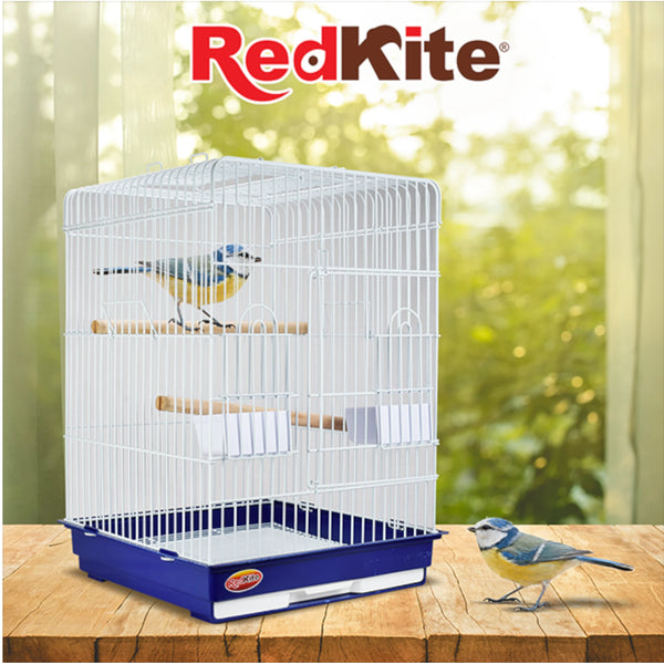 Jaula Macao exhibida con un ave en percha, fondo natural con logo RedKite.
