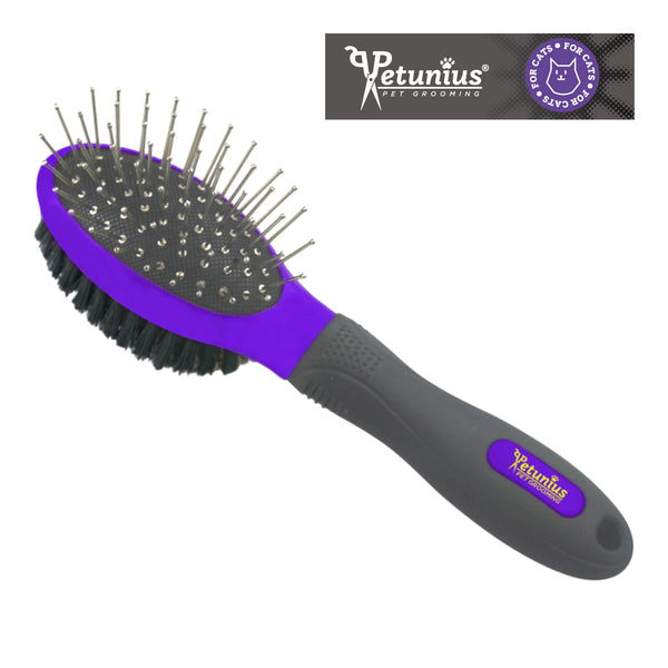 Cepillo doble para gatos con puntas plásticas y cerdas metálicas para eliminar pelo suelto y dar volumen al pelaje.